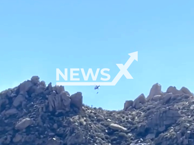 FireBird 10 and technical rescue crews rescue a male hiker from the top of Toms Thumb, in Scottsdale, Arizona, USA. Note: Picture is a screenshot from the video. (Scottsdale Fire Department/Clipzilla)