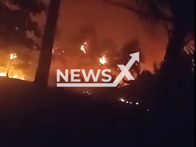 Fire in Corosito village, Chiquimulilla, Guatemala, on Wednesday, Feb. 21, 2024. Note: Picture is a screenshot from the video. (Elder Juarez, Conred/Clipzilla)