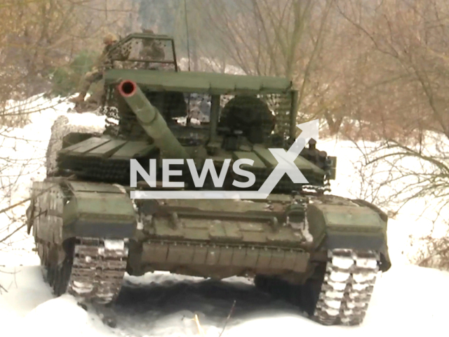 The crews of the T-72B3M tanks destroy platoon strongholds and manpower of the Armed Forces of Ukraine in Kupiansk, Ukraine. Note: Picture is a screenshot from the video. (Ministry of Defense of the Russian Federation/Clipzilla)