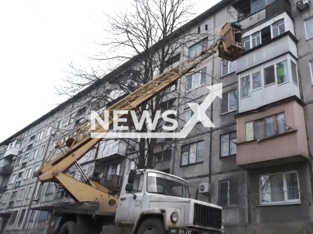 Rescue workers carrying out restoration work on buildings damaged by Russian shelling in Selydove, Ukraine. Note: Picture is a screenshot from the video. (Ministry of Internal Affairs of Ukraine/Clipzilla)