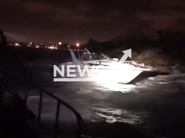 The rescue of the passengers of a stranded boat near Marina del Rey, California, USA, on Wednesday, Feb. 21, 2024. Note: Picture is a screenshot from the video. (Los Angeles County Sheriff's Department/Clipzilla)