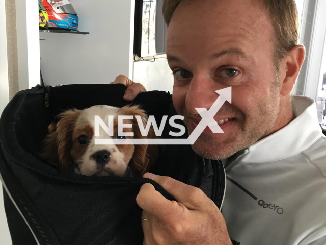 Rubinho Barrichello poses with his dog in undated photo. The animal died after eating 11 cigarette butts. Note: Private photo. (@rubarrichello/Newsflash)