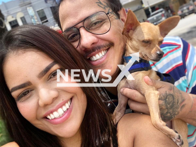 Luiz Rodrigo Goncalves poses with Pamela Gabrielle Oliveira in undated photo. The couple from Minas Gerais in Brazil decided to sell adult content. Note: Private photo. (Luiz Rodrigo Goncalves/Newsflash)