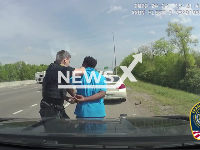 Officers ran over by fleeing suspect Roy Nicholson in Franklin, Tennessee, USA. Note: Photo is a screenshot from the video (@FranklinTNPD/Newsflash)