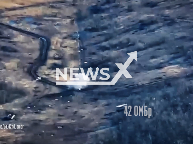 Ukrainian kamikaze drones take out Russian soldiers on the frontlines in Ukraine in undated footage. The footage was released by the 42nd Separate Mechanised Brigade of the Armed Forces of Ukraine on Tuesday, Feb. 27, 2024.Note: Picture is screenshot from a video. (@ua_42nd_ombr/Newsflash)