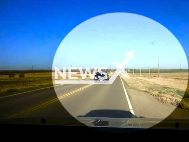 Trooper Steve Morris evades a distracted driver drove directly into his lane, in Kansas, USA. Note: Picture is a screenshot from the video. (Kansas Highway Patrol/Clipzilla)