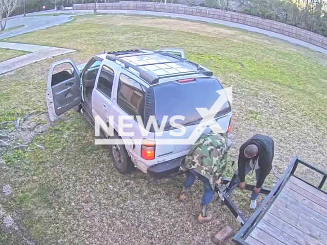 Two suspects steal a utility trailer from Bay High School grounds, in Bay St. Louis, Mississippi, USA,  on Sunday, Feb. 25, 2024. Note: Picture is a screenshot from the video. (Bay St. Louis Police Department/Clipzilla)