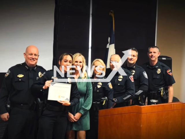 Officer Jessica Jones rescues a motorist from a fiery crash, on Aug. 26, 2024, in McKinney, Texas, USA. Note: Picture is a screenshot from the video. (McKinney Police Department/Clipzilla)