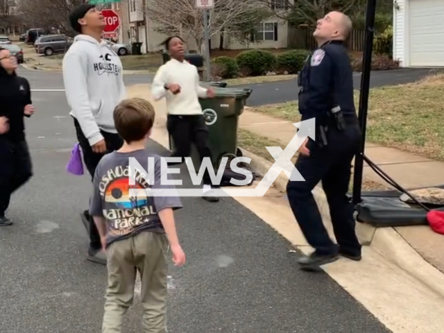 Police vs Teachers basketball game at Culpeper County High School, in Culpeper County, Virginia, USA. Note: Picture is a screenshot from the video. (Culpeper Police Department/Clipzilla)