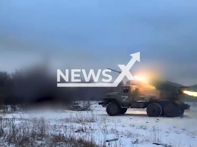 Russian crew of the self-propelled 122 mm multiple rocket launcher destroy the positions of the Ukrainian Armed Forces in the Donetsk area, Ukraine. Note: Picture is a screenshot from the video. (Ministry of Defense of the Russian Federation/Clipzilla)