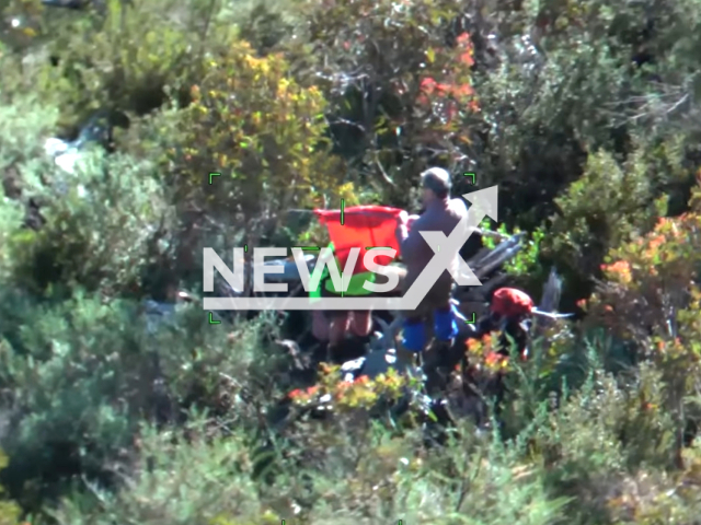 Air Wing and Search and Rescue Squad officers rescue two men from Mount Bogong in Victoria, Australia, on Sunday, March 3, 2024. Note: Picture is screenshot from a video. (Victoria Police/Clipzilla)