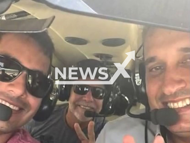 The trio poses before the plane took off in Barreiras, Brazil, undated. The three men died after the crash. Note: Private photo. (Newsflash)