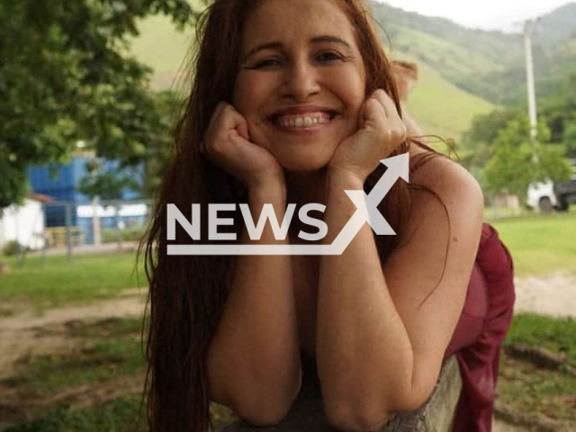 Glaubenia Serpa Costa, 53, poses in undated photo. Her body was found buried in the backyard of her house in Rio das Ostras, Brazil. Note: Private photo. (@dra_glaubeniaserpacosta/Newsflash)