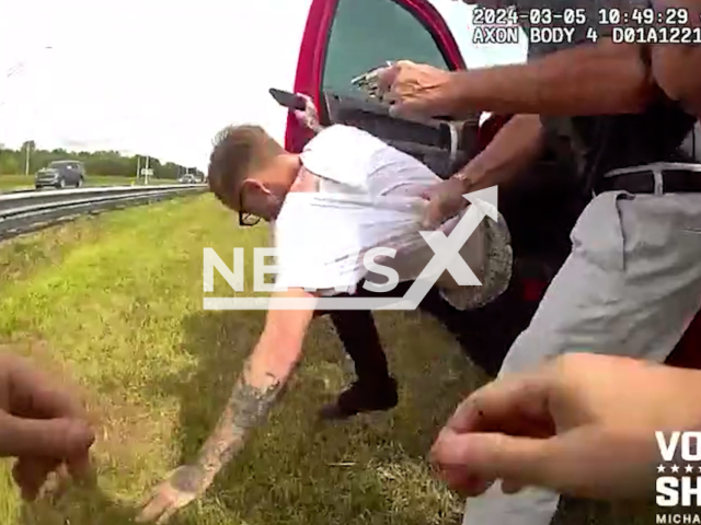 Police stop a reckless driver in a red Chevy pickup on I-95, in Volusia Florida, USA, on Tuesday, March 5, 2024.Note: Picture is screenshot from a video. (Volusia Sheriff's Office/Clipzilla)