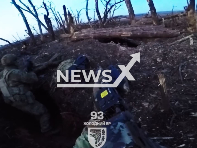 Ukrainian forces clear dugouts and destroy Russian military positions near Bakhmut in Ukraine in undated footage. The footage was released by the 93rd Separate Mechanized Brigade Kholodny Yar on Monday, Mar. 11, 2024. Note: Picture is screenshot from a video (@93OMBr/Newsflash)