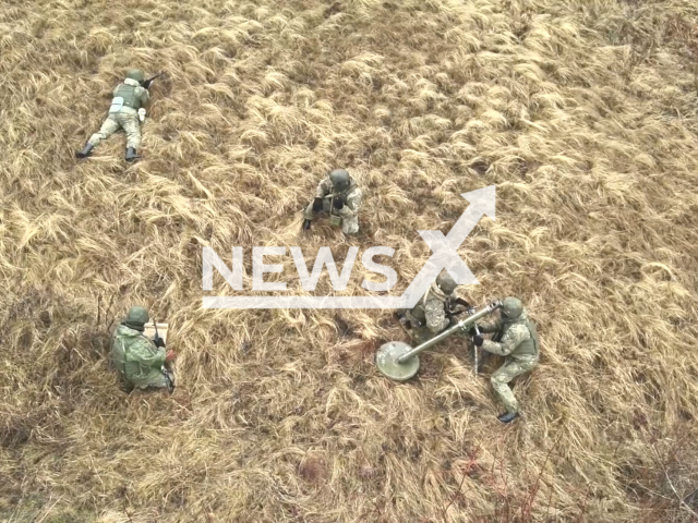 Russian military personnel ensure the safety of passenger and freight transportation on the railways in Donbas, Ukraine. Note: Picture is a screenshot from the video. (Ministry of Defense of the Russian Federation/Clipzilla)