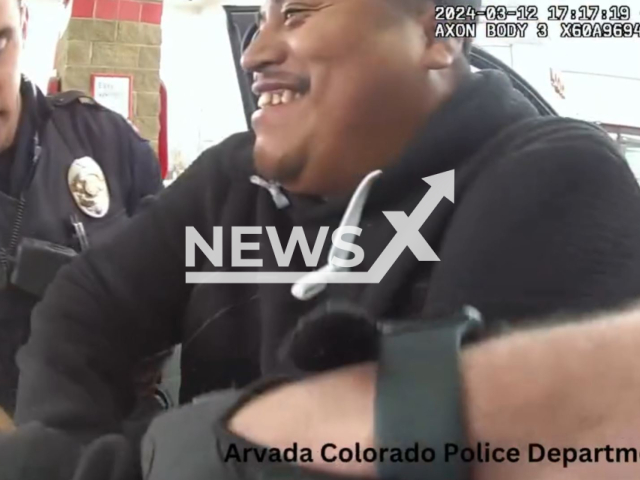 Police arrest two men found drunk in a vehicle in Arvada, Colorado, USA, on Tuesday, March 12, 2024. Note: Picture is screenshot from a video (Arvada Police Department/Clipzilla)