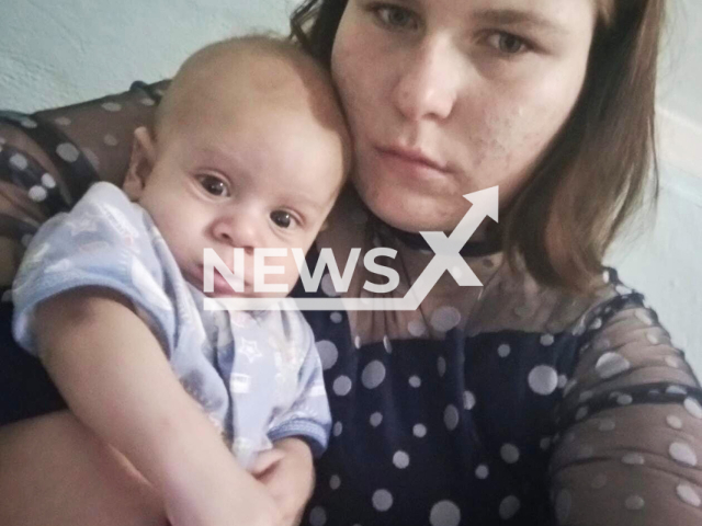 Photo shows Anastasia G., 21, with her son from Kargat, Novosibirsk Oblast, Russia, undated. Her 3-month-old baby fell into a coma after falling out of bed. Note: Private photo. (Anton S./Newsflash)