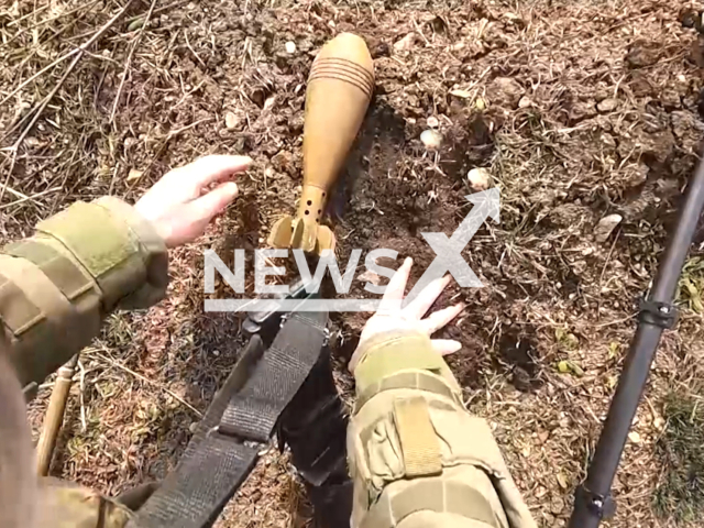 Russian sappers clear mines from the liberated territory of Donbas, Ukraine. Note: Picture is a screenshot from the video. (Ministry of Defense of the Russian Federation/Clipzilla)