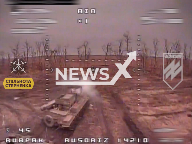 Kamikaze drones from the Azov Special Forces destroy Russian armoured tractors trying to take a Ukrainian Leopard 2 off the battlefield near Ternyin Donetsk Oblast in Ukraine in undated footage. The footage released by the Azov Special Forces Brigade of the National Guard of Ukraine on Tuesday, Mar. 19, 2024.Note: Picture is screenshot from a video. (@azov_media/Newsflash)