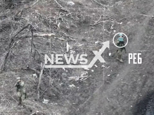 Ukrainian drones drop bombs on the Russian soldiers on the frontlines in Ukraine in undated footage. The footage released by the 92nd Separate Assault Brigade named after Koshov Chieftain Ivan Sirk of the Armed Forces of Ukraineon Tuesday, Mar. 19, 2024. Note: Picture is screenshot from a video (@brigada92_war/Newsflash)