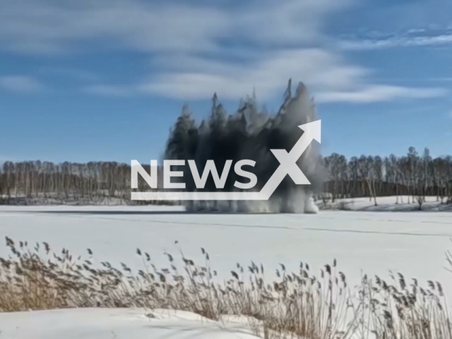 Specialists of the engineering and sapper unit of the Russian Strategic Missile Forces blast the ice on the Ob River to protect populated areas from floods, Russia. Note: Picture is a screenshot from the video. (Ministry of Defense of the Russian Federation/Clipzilla)