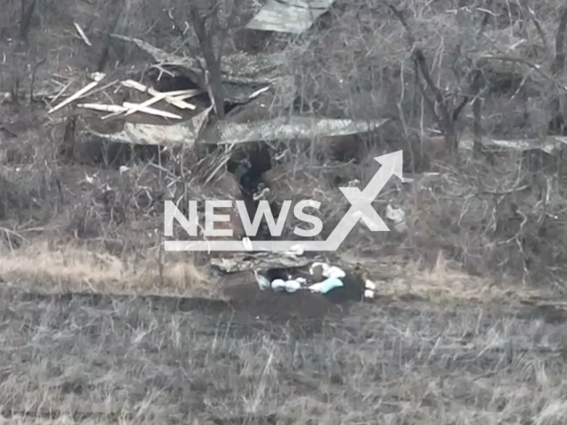 Ukrainian drones target Russian soldiers and military positions on the frontlines in Ukraine in undated footage. The footage released by the Ground forces of the Armed Forces of Ukraine on Tuesday, Mar. 26, 2024. Note: Picture is screenshot from a video (@landforcesofukraine/Newsflash)