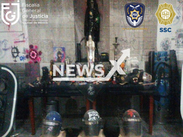 Altar to Santa Muerte found during the recovery of a property in Mexico City, Mexico. Note: Prosecutor's photo. (@FiscaliaCDMX/Newsflash)