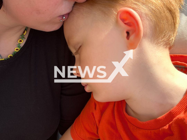 Anika Ball, aged 32, from the city of Cologne, Germany, and her son Logan, aged 4, pose in undated photo. They were reunited after being separated for two years. Note: Private photo taken from social media. (@hellcatany/Newsflash)