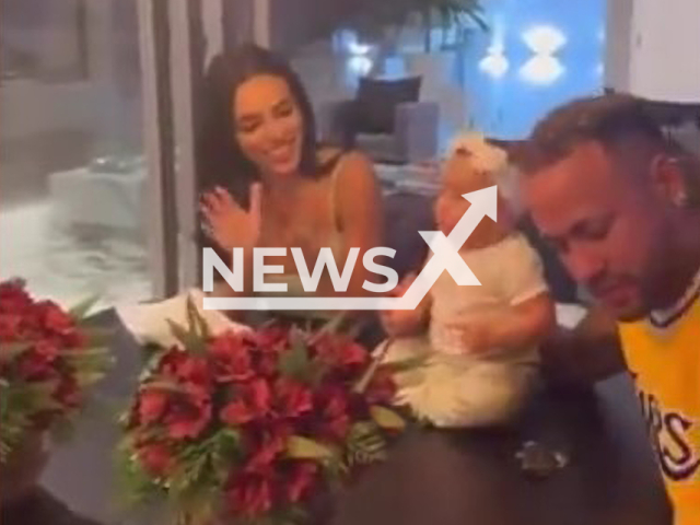 Neymar appears to play poker during congratulations for his daughter, undated. Neymar appears alongside the little one and Bruna. Note: Picture is a screenshot taken from a video. (Newsflash)