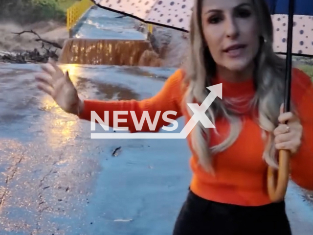 Bridge is washed away during recording of a mayor in Santa Tereza, Brazil, Tuesday, April 30, 2024. The Mayor Gisele Caumo was warning about the impacts of the rain.Note: Picture is screenshot from a video. (@prefeiturasantatereza/Newsflash)