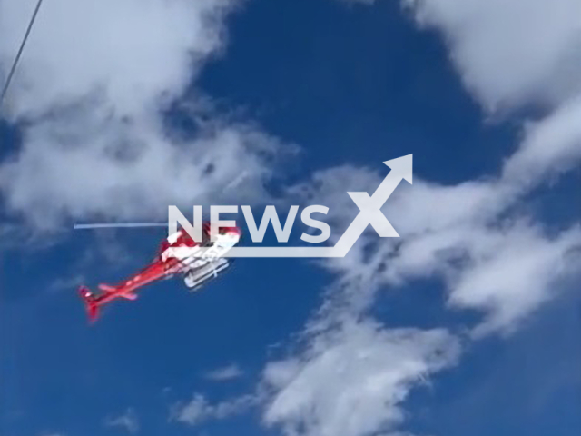 Image shows a helicopter rescuing more than 600 stranded skiers, undated photo. It happened after a power outage at the Bernese Highlands, Switzerland, on Apr. 27, 2024. Note: Photo is a screenshot from a video. (Newsflash)