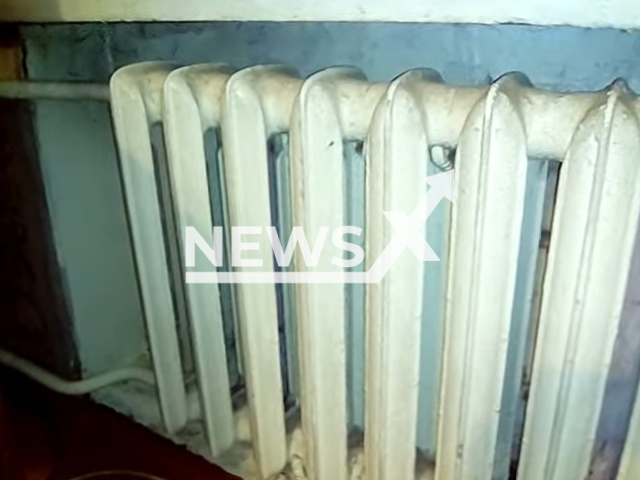 Illustrative picture of tubular radiator for heating houses, undated. Child died from burns getting from radiator behind sofa at home in Zissermanovsky khutor in Krasnodar Krai, Russia. Note: Picture is screenshot from a video. (Newsflash)