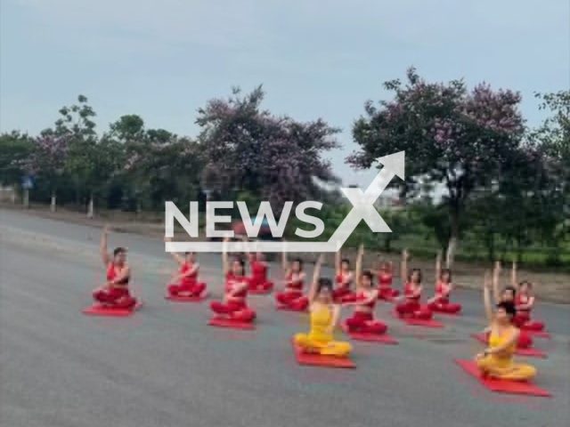 Picture shows women doing yoga in Thai Binh Province, Vietnam. They were fined. Note: Private photo taken from social media. (Newsflash)