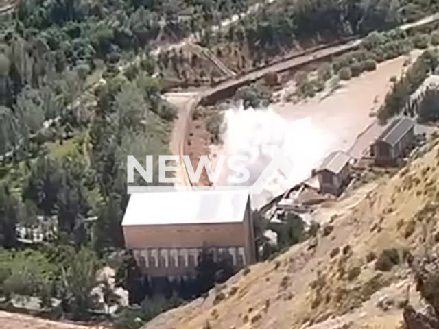 Footage shows water being released from the dam of the Gissar reservoir in Qashqadaryo Region, Uzbekistan on Monday, June 10, 2024. The Department of Internal Affairs said the rumours of it being broken were false. Note: Picture is screenshot from a video. (Newsflash)