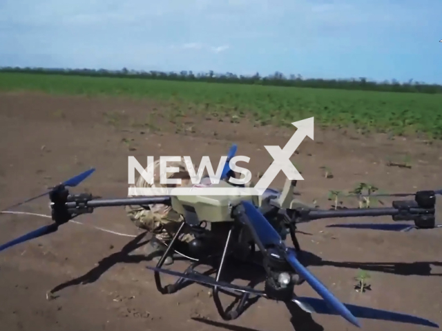 Photo shows new Russian strike-transport drone for delivering heavy war cargoes quickly on frontlines of Ukraine on Monday, June 17, 2024. The drone fired a missile from a launcher attached to it. Note: Picture is screenshot from a video. (Russian MoD/Newsflash)