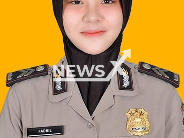 Police officer Fadhilatun Nikmah, 28, poses in undated photo. She burned her husband to death after he spent his 13th-month salary on online gambling,  in East Java, Indonesia.  Note: Private photo taken from social media. (Newsflash)