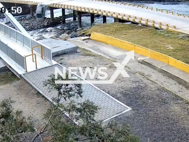 A woman loses control of her car and drives into the river from a bridge, in Rio Tercero, Argentina, in June, 2024. She and her dog made it out unharmed. Note: Picture is screenshot from a video. (Newsflash)