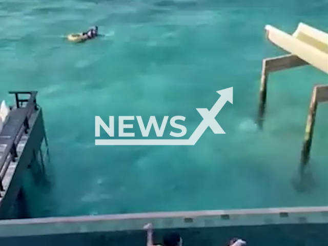 Sergio Arribas rescues a couple who were in danger of drowning in the Maldives, undated.  He and his girlfriend, Ana Martín, were relaxing when they heard cries for help. Note: Picture is screenshot from a video. (Newsflash)