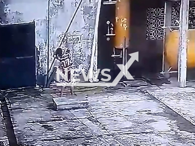 A boy trying to remove kite caught on electrical wires, in Tefe, Brazil, on Wednesday, June 19, 2024. He was electrocuted  but survived. Note: Picture is screenshot from a video. (Newsflash)