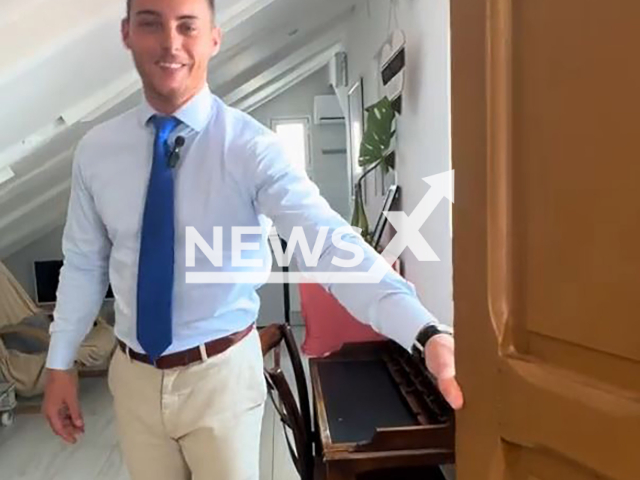 Julio Alcalde shows a 27 square meter attic apartment sold for EUR 199 thousand (GBP 168 085) in Madrid, Spain, undated. It has sloping walls and features a mattress is on the floor. Note: Picture is screenshot from a video (@julioalcalde.elite/Newsflash)