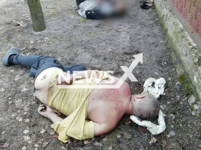 The body one of the men allegedly  tortured and killed by the Russian Army  found in the village of Zvdyzhivka, Ukraine, in April, 2022. Note: Photo from emergency services. (@spravdi/Newsflash)