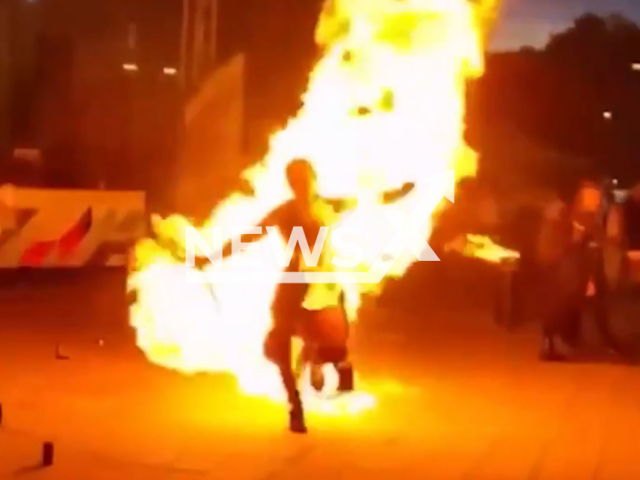 The clothes of a fire show artist caught fire during a performance in Lyubertsy, Moscow Oblast, Russia on Saturday, June 29, 2024. The incident occurred during the celebration of Youth Day. Note: Picture is screenshot from a video (Newsflash)