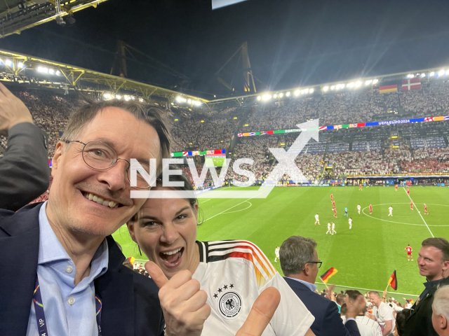 Federal Minister of Germany for Health Minister Karl Lauterbach, 61, and Federal Minister for Foreign Affairs of Germany Annalena Baerbock, 43, pose in undated photo. They were spotted at the EURO2024 game, June 29, 2024. Note: Private photo from social media. (@Karl_Lauterbach/Newsflash)