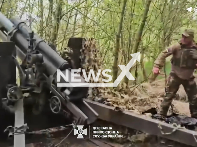 Ukrainian border guards hit Russian field ammo depots and military equipment with artillery strikes in Ukraine in undated footage. The footage was released by the State Border Service of Ukraine on Wednesday, July 3, 2024.
Note: Picture is screenshot from a video. (@DPSUkr/Newsflash)