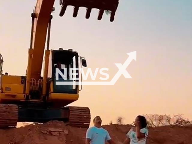 Couple uses excavator at gender reveal party in Pocone, Brazil, Sunday, June 31, 2024. They are expecting a boy. Note: Private photo taken from local media. (Newsflash)