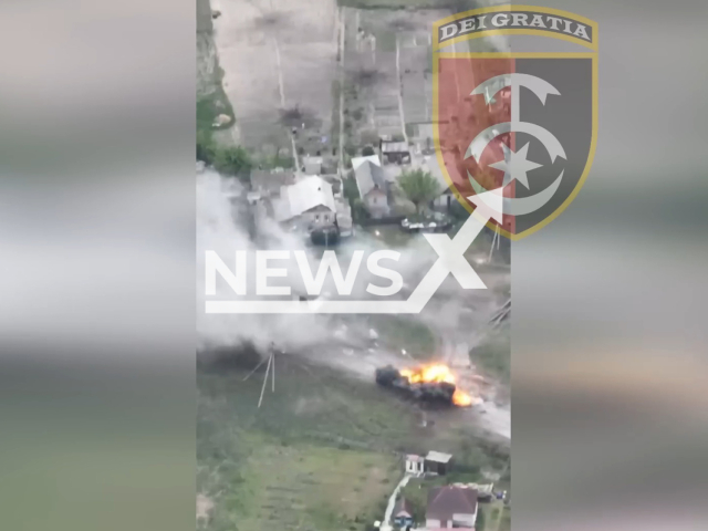 The destruction of the Russian armored personnel carrier by the 30th separate mechanized brigade Prince Constantine of Ostroh in Ukraine. Note: Picture is a screenshot from a video (30 OMBr/Newsflash)