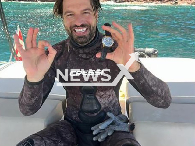 Giorgio, 38, poses in undated photo. He found a EUR 65,000 (GBP 54,953) Patek Philippe watch at the sea bottom in Mallorca, Spain. Note: Private photo from local media. (Newsflash)