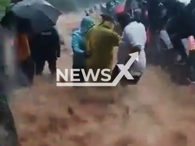 Image shows people stuck at Raigad Fort's stairway, Maharashtra State, India, undated photo. It happened during a major flood, July 7, 2024. Note: Photo is a screenshot from a video. (Newsflash)