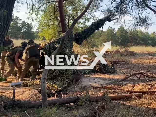 Crews of 122-mm D-30 guns of the Dnepr group of forces destroy fortified positions of the Ukrainian Armed Forces in Kherson, Ukraine on the 10th July 2024.
Note: Picture is screenshot from a video. (Russian Ministry of Defence (MoD)/Clipzilla)